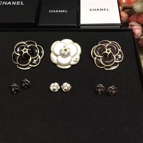 chanel camellia brooch outfit|Chanel camellia hoop earrings.